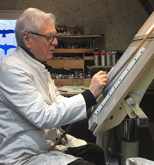 Artist Bernard Louedin painting